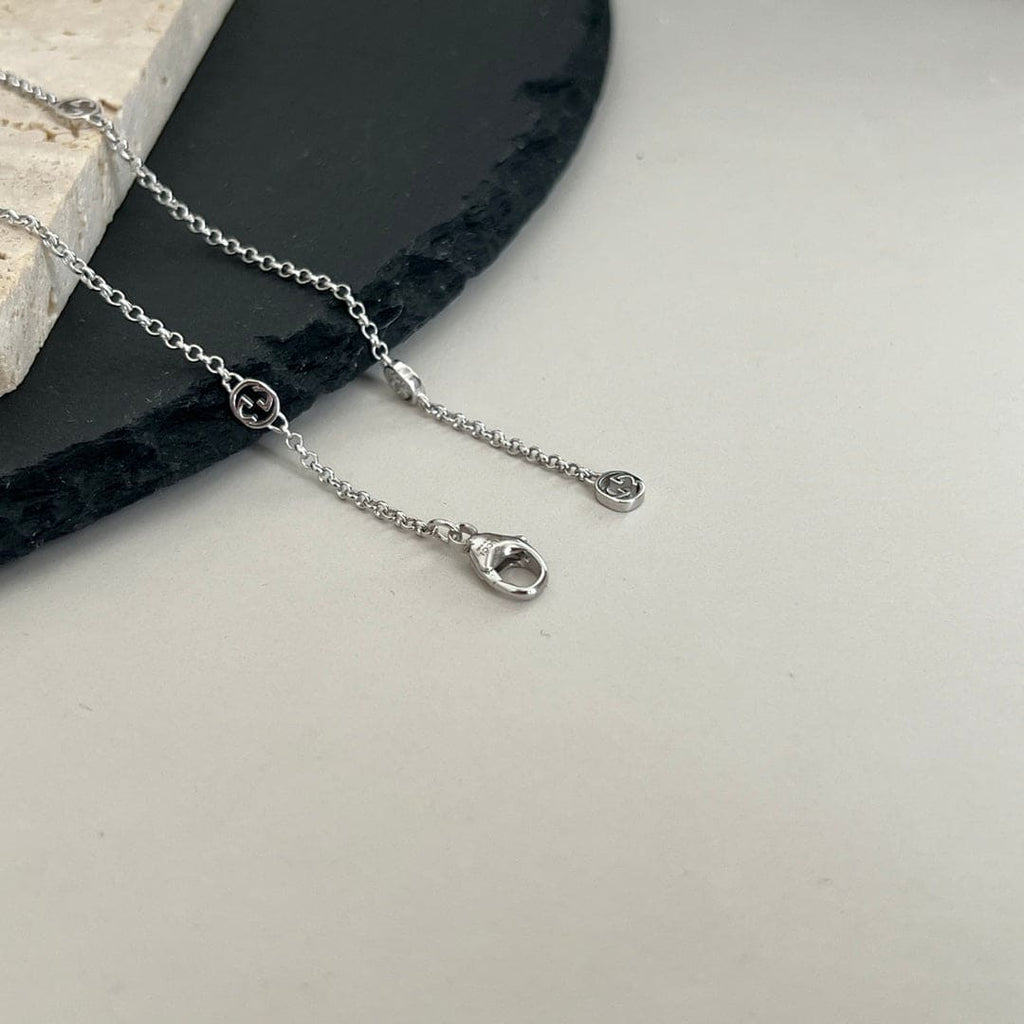 Double Gucci Interlocking Gucci Heart Lightning Charm Necklace